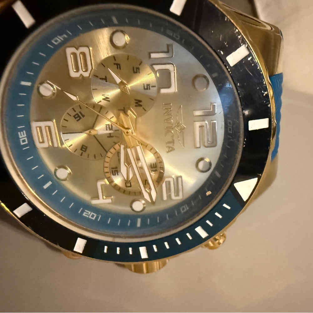 Invicta Gold and Blue Dial Watch